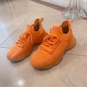 Orange Steve Madden running shoes